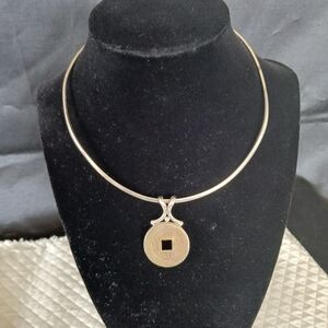 Sterling silver pendant with Chinese coin